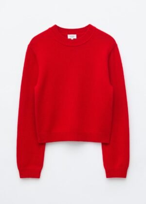 Red cashmere-blend jumper laid flat, featuring a round neckline, long sleeves, ribbed cuffs and hem, and gently dropped shoulders.